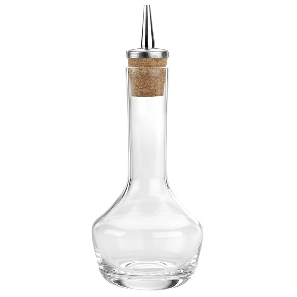 A clear glass Barfly bitters bottle with a metal cap.