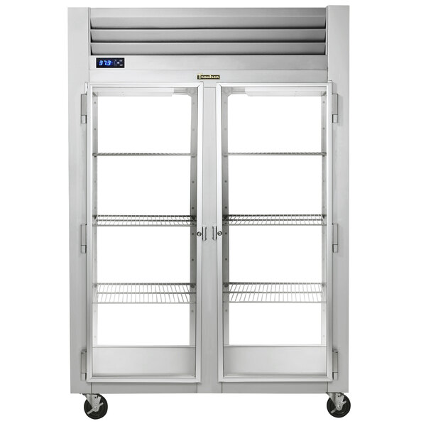 A Traulsen reach-in refrigerator with two glass doors on a white background.
