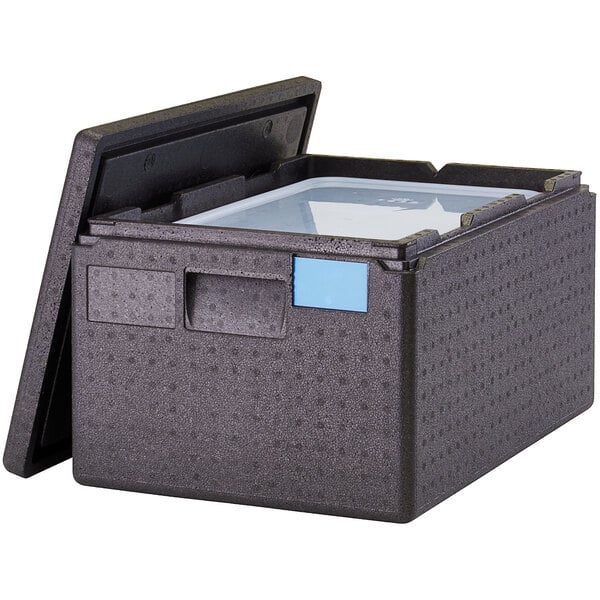 A black Cambro Cam GoBox top loading food pan carrier with a lid open and a full-size food pan inside.