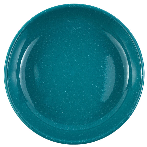 A Crow Canyon Home turquoise speckled enamelware pasta plate with a rim.