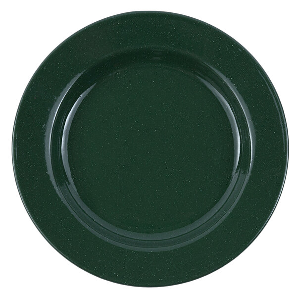 A Crow Canyon Home Stinson enamelware salad plate with a forest green speckled surface and wide rim.