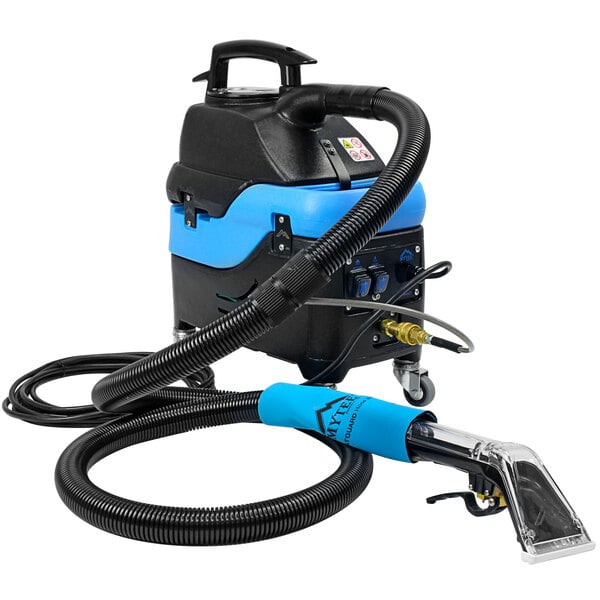 A blue and black Mytee S-300 Tempo upholstery spotter with a hose.