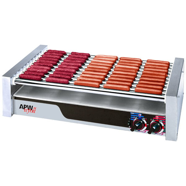 A APW Wyott hot dog roller grill with hot dogs cooking.