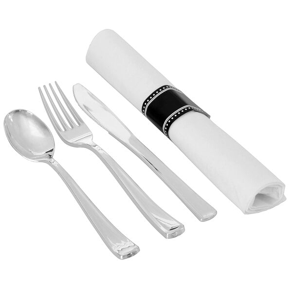 A Fineline pre-rolled silverware set with a napkin, fork, knife, and spoon.