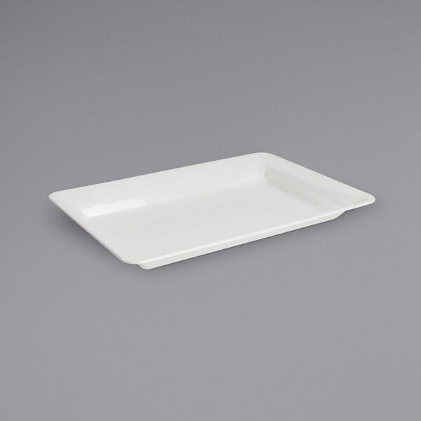 A white rectangular polypropylene tray with a handle.