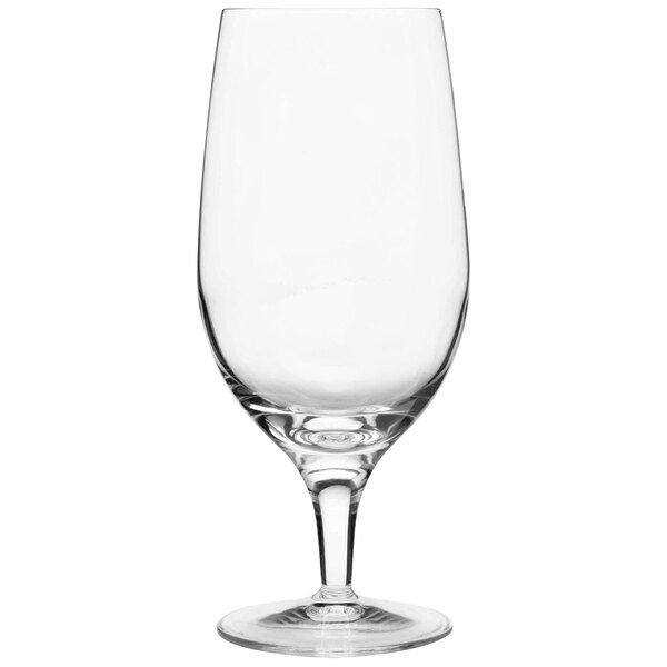 A clear wine glass with a red band.