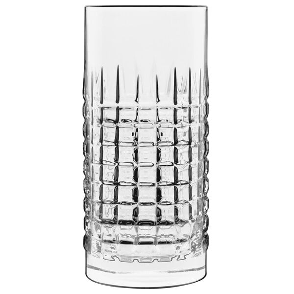 A clear Luigi Bormioli highball glass with a patterned design.