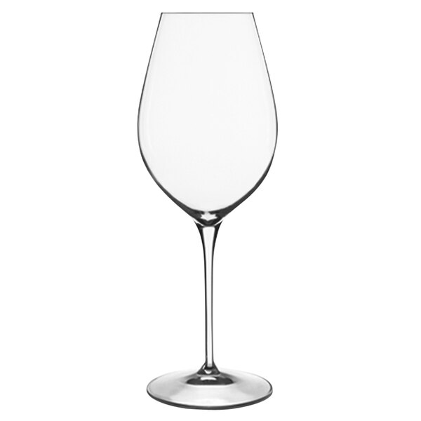 A close-up of a Luigi Bormioli Maturo white wine glass with a long stem.