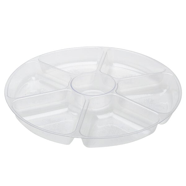 A clear plastic tray with seven compartments.