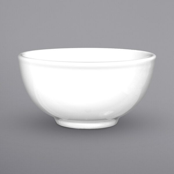 A white porcelain nappie bowl with a white rim.