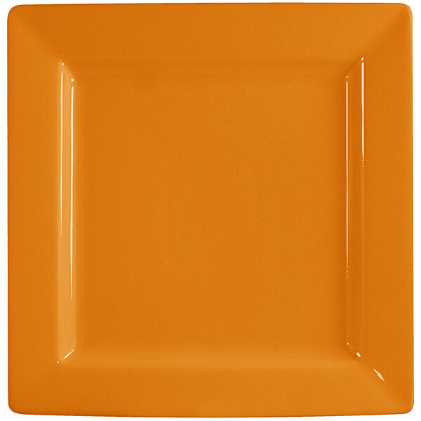 An orange square porcelain plate with a white wide rim.