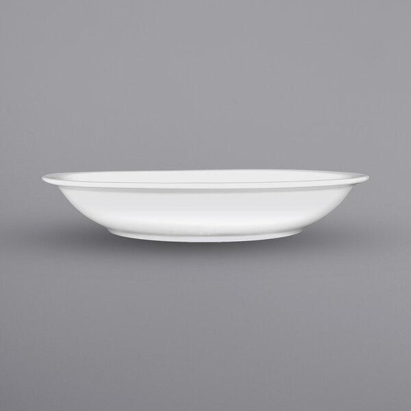 A white International Tableware porcelain serving bowl with a rolled edge.