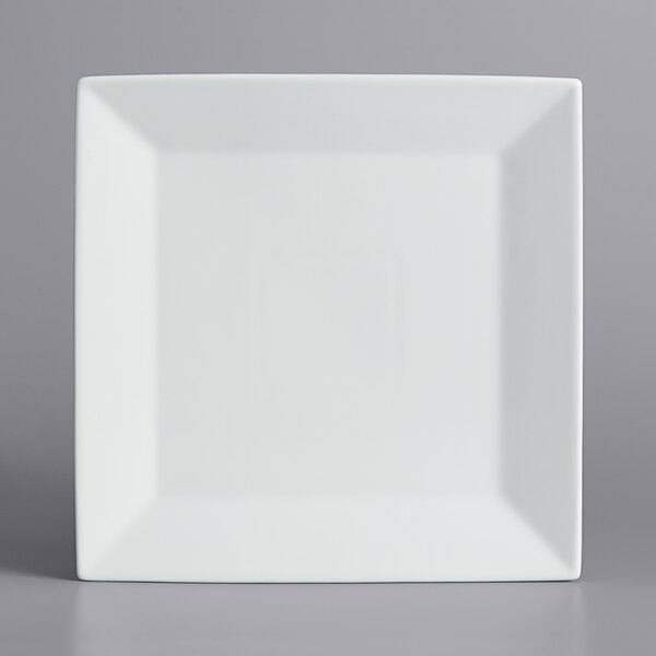 A white square plate on a gray background.