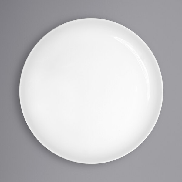 A white International Tableware Torino porcelain plate with a white rim.