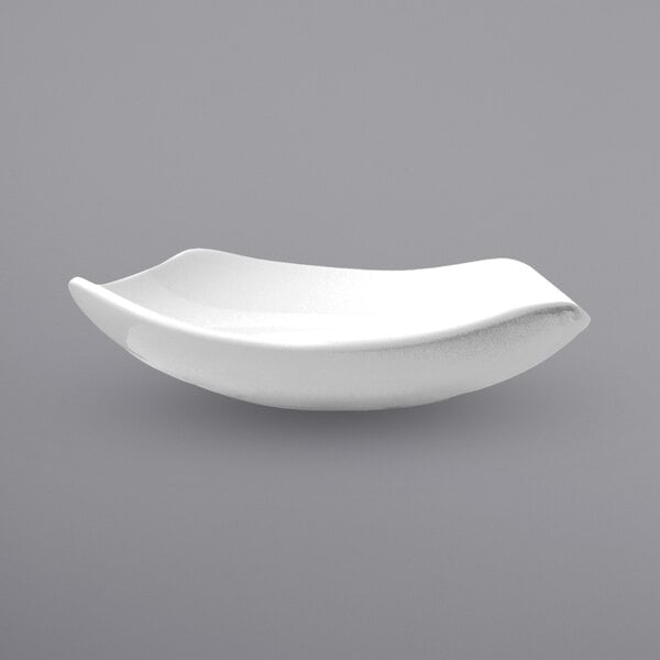An International Tableware Quad European White Porcelain Soup Plate with a flared rim.