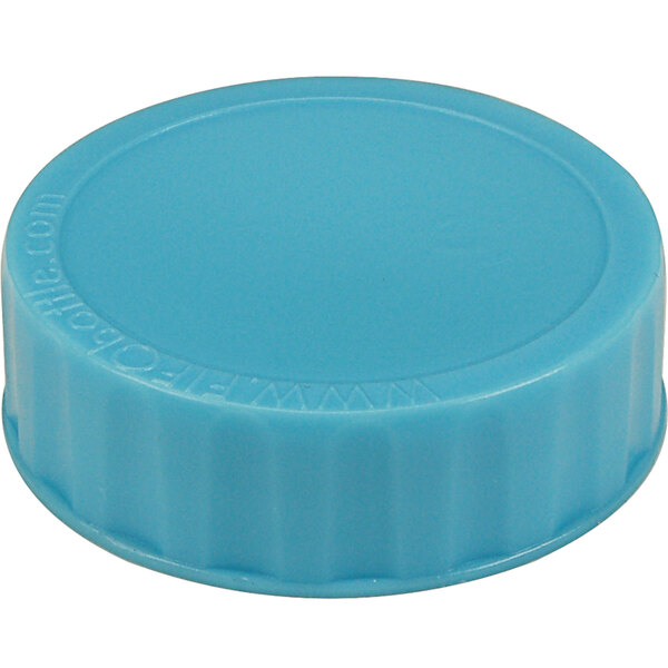 A light blue plastic cap for FIFO squeeze bottles with a lid on it.
