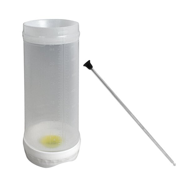 A white plastic FIFO Portion Pal squeeze bottle with a long stick inside.