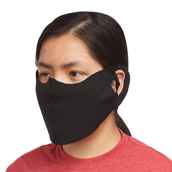 A woman wearing a black Snap Drape Contour face mask.