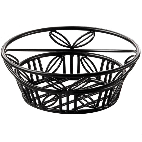 An American Metalcraft black wrought iron bread basket with a circular leaf design.