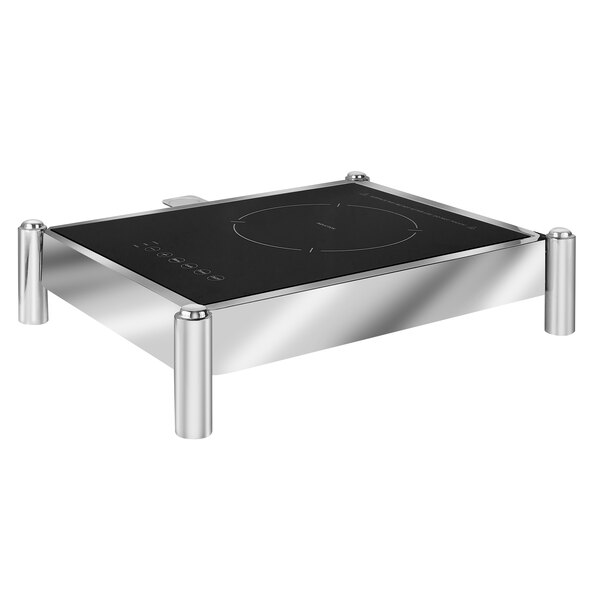 An Eastern Tabletop stainless steel stackable induction cooker with a touch display on a countertop.