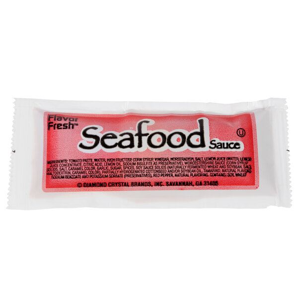 A case of 200 white portion packets of seafood sauce.