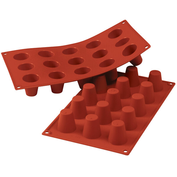 A red silicone tray with small cups.