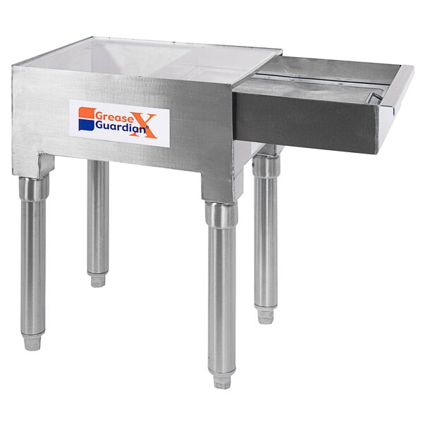 A stainless steel metal table with a Grease Guardian DS-1 solids strainer in a drawer.