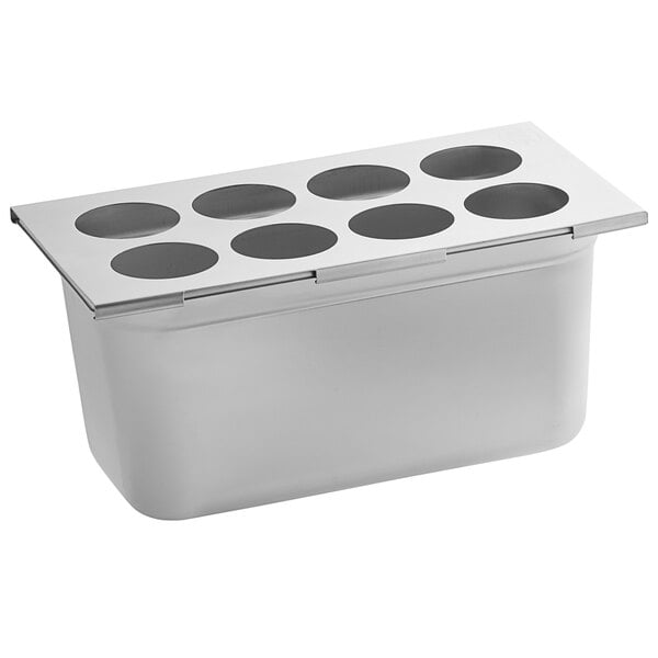 A stainless steel tray with six holes in it.