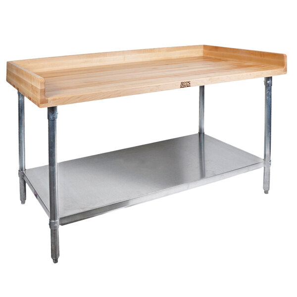 A John Boos wood top baker's table with a stainless steel base and adjustable undershelf.