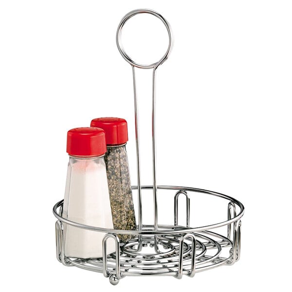A Vollrath chrome wire condiment caddy holding salt and pepper shakers.