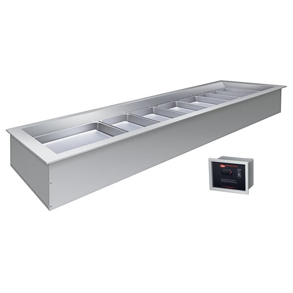 A Hatco rectangular silver drop-in cold food well with four rectangular pans inside.