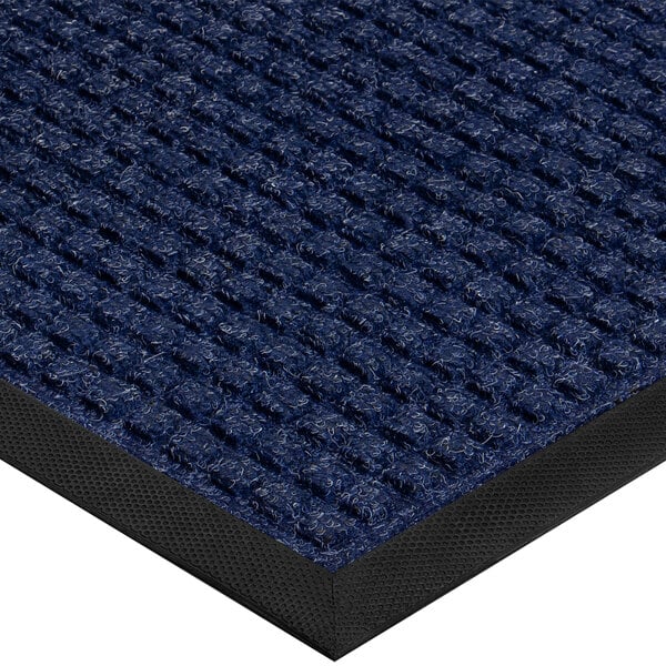 A white and blue Lavex waffle entrance mat with a black border.
