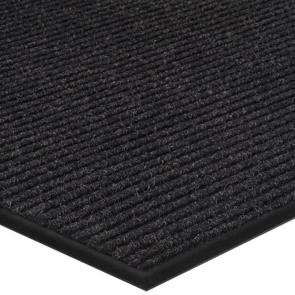 A black Lavex indoor entrance mat with black stripes.
