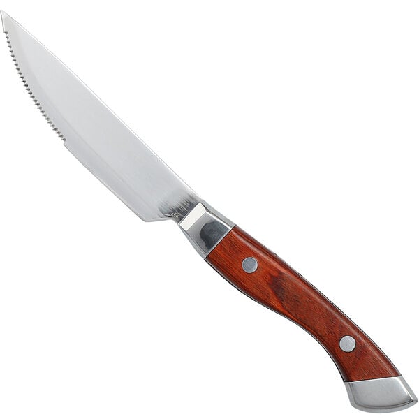 A Fortessa steak knife with a chestnut red wooden handle.