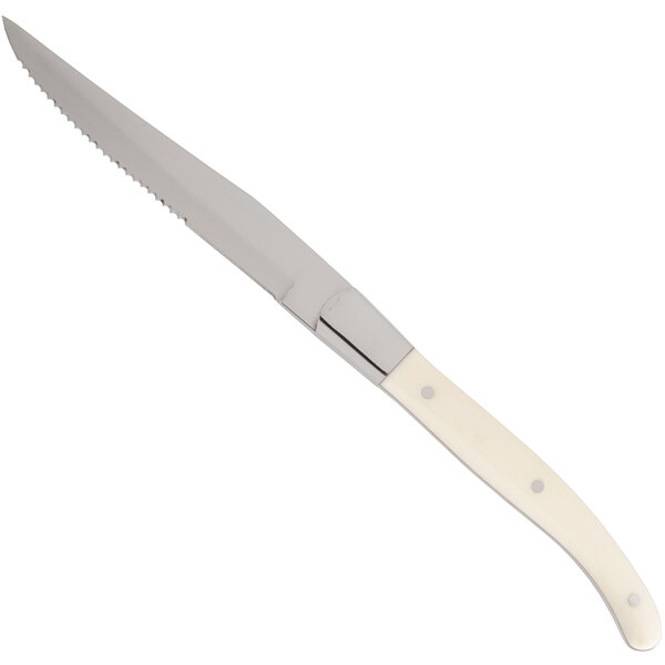 A Fortessa steak knife with a blonde handle and a silver blade.