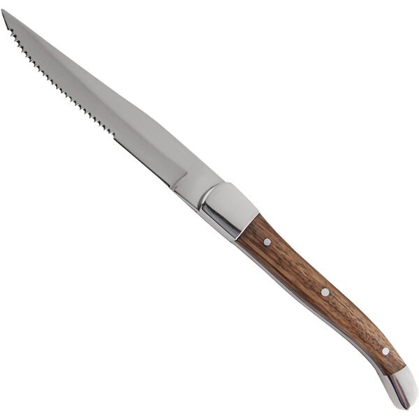 A Fortessa steak knife with a light wood handle and silver blade.