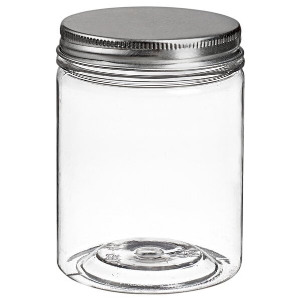 A clear plastic Solia jar with a silver lid.