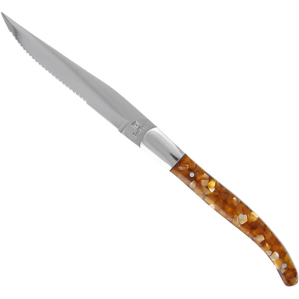 A Fortessa steak knife with a brown wooden handle and a metal serrated blade.