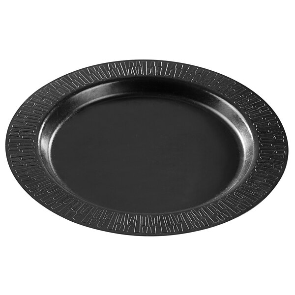 A Solia round black sugarcane plate with a black border.