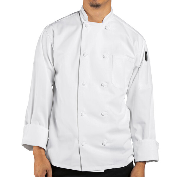 A man wearing a white Uncommon Chef long sleeve chef coat with a knot button closure.