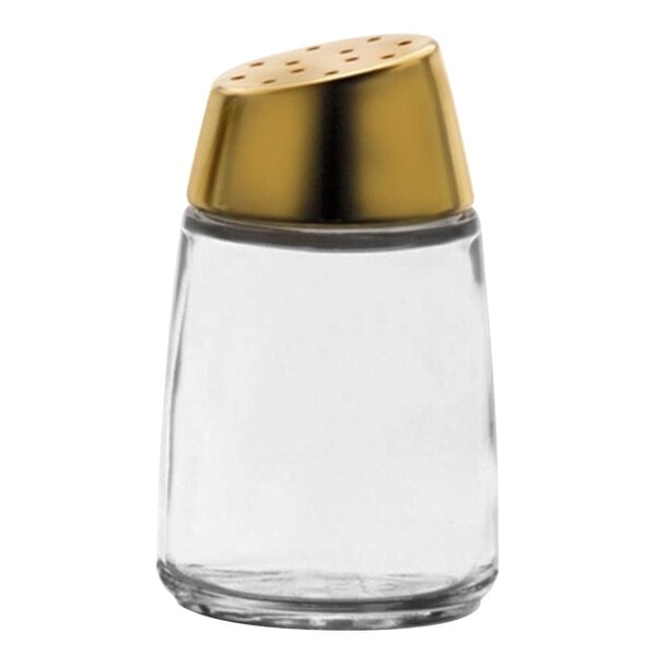 A Vollrath glass salt shaker with a gold top.