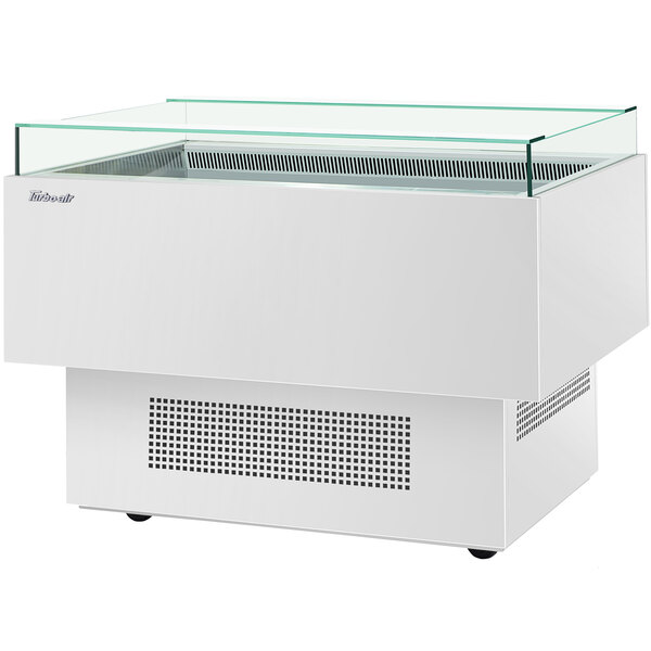 A white rectangular Turbo Air open display case with a glass top.