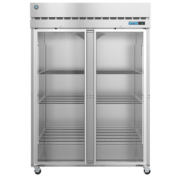 A stainless steel Hoshizaki reach-in freezer with two glass doors and shelves.