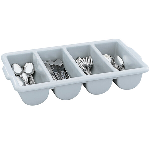 A white Vollrath 4-compartment container with silverware inside.