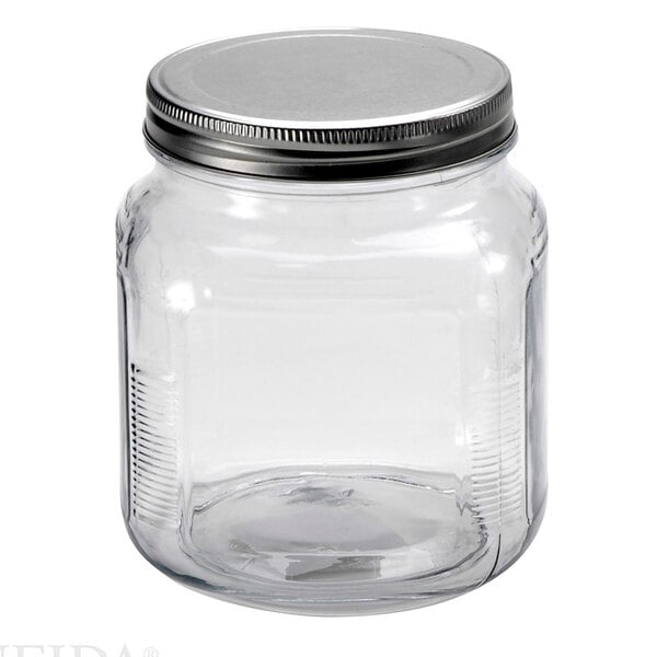 An Anchor Hocking clear glass cracker jar with a silver metal lid.