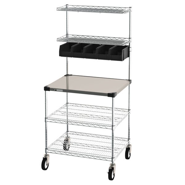 A Metro Drive-Thru Order Prep Station with stainless steel shelving and a shelf on wheels.