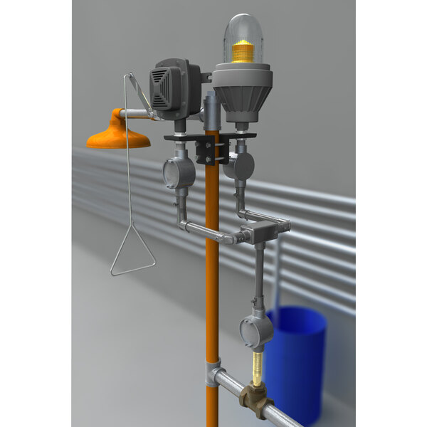 A machine with a Guardian Equipment light and alarm horn on a metal pipe with a blue and yellow cylinder.