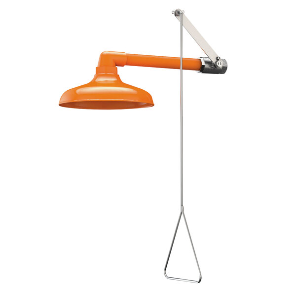 An orange and white horizontally mounted emergency shower with a plastic head hanging from a metal hook.