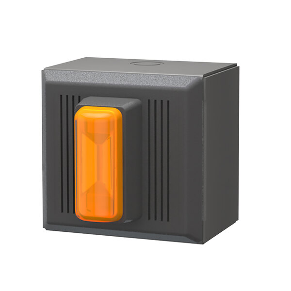 A black box with a yellow light and orange button.