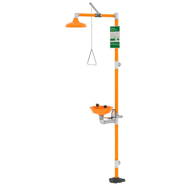 A Guardian Equipment G1902P safety station with an orange and silver eyewash and shower stand.